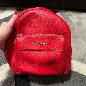 Gently worn authentic Calvin Klein woman’s back pack for sale.